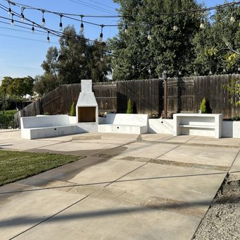 National Tree Care & Landscape - New low retaining wall, seating area with outdoor fireplace and landscaping - Landscaping Near Me National Tree Care & Landscape - New low retaining wall, seating area with outdoor fireplace and landscaping - Landscaping Near Me