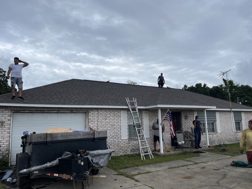 Slide of TNW Roofing