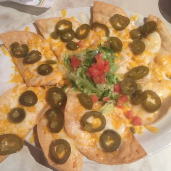 Chuy's - Nachos with cheese, jalapenos, and a lettuce and tomato garnish. The chips are so crispy! - Tex-Mex Near Me - Selma, Texas Chuy's - Nachos with cheese, jalapenos, and a lettuce and tomato garnish. The chips are so crispy! - Tex-Mex Near Me - Selma, Texas
