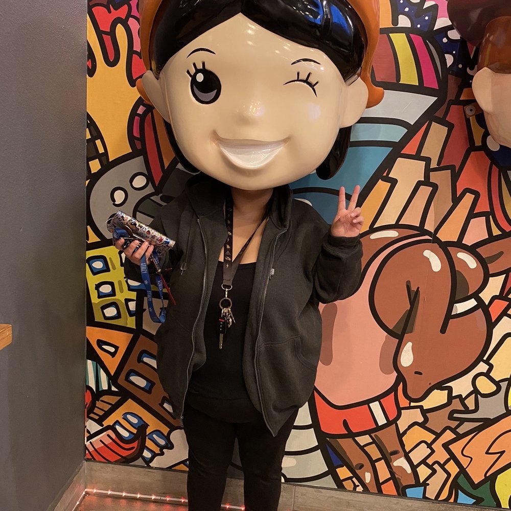 Chami Tea Bar - super random freaky girl head on the wall. - Bubble Tea Near Me - Whittier, California