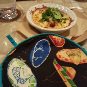Minero - Queso fundido and pouch that's holding the tortillas - Mexican Near Me - Atlanta, Georgia