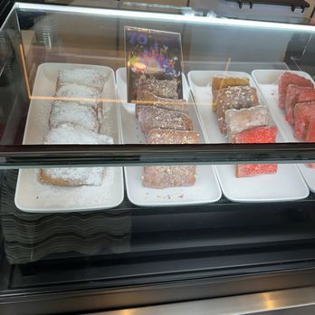Beignets Expressed - Only four flavors to select from so customers can hurry out... - Desserts Near Me - Anaheim, California Beignets Expressed - Only four flavors to select from so customers can hurry out... - Desserts Near Me - Anaheim, California