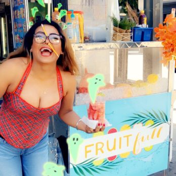 Fruitfull - a woman standing in front of a fruitfull stand - Fruits & Veggies Near Me - Los Angeles, California Fruitfull - a woman standing in front of a fruitfull stand - Fruits & Veggies Near Me - Los Angeles, California