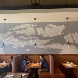 Our waiter created this amazing gray and white mural on the side wall of Wasabi Bistro! Check out the details on the little boat! Our waiter created this amazing gray and white mural on the side wall of Wasabi Bistro! Check out the details on the little boat!