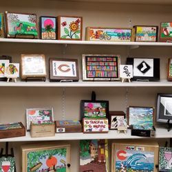 Selection of repurposed boxes with original art.