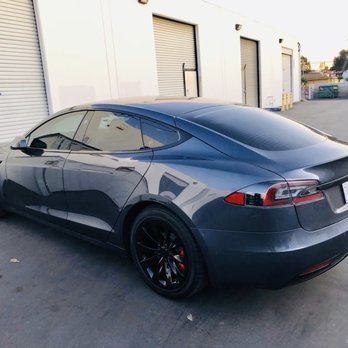 Dependable Guys - model s: window tint, gloss black chrome delete, gloss black powder coat rims, red calipers, red T logos - Auto Customization Near Me - Santa Ana, California