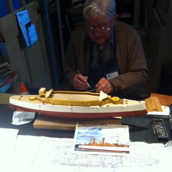 USS Constitution Museum - Frank Clements working on USS Olympia model, 5 months done, 9 months to go - Museums Near Me - Boston, Massachusetts USS Constitution Museum - Frank Clements working on USS Olympia model, 5 months done, 9 months to go - Museums Near Me - Boston, Massachusetts