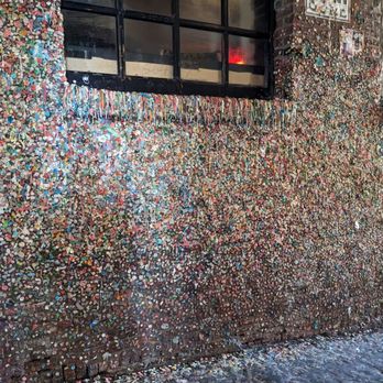 The Gum Wall - Part of the Gum Wall with gum dripping off the windowsill - Local Flavor Near Me - Seattle, Washington The Gum Wall - Part of the Gum Wall with gum dripping off the windowsill - Local Flavor Near Me - Seattle, Washington