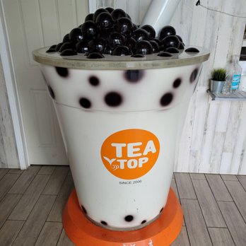 Tea Top - A sculpture of a cup of bubble tea. - Bubble Tea Near Me - Atlanta, Georgia Tea Top - A sculpture of a cup of bubble tea. - Bubble Tea Near Me - Atlanta, Georgia