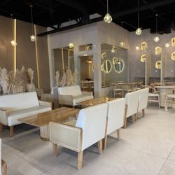 Marib Coffee - Additional seating area. Private room in the back corner for private meetings.