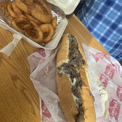 Angelina's Submarine Shops - Beer battered onion rings and hot steak sub, better plan to share this!