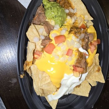 Taco Bell - Nachos Bell Grande is now TINY. Paid extra for guacamole and that is a teaspoon portion. - Fast Food Near Me - Pevely, Missouri Taco Bell - Nachos Bell Grande is now TINY. Paid extra for guacamole and that is a teaspoon portion. - Fast Food Near Me - Pevely, Missouri