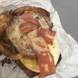 Dunkin' - "Maple Sugar Bacon Breakfast Sandwich" with raw bacon...