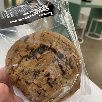 &pizza - a hand holding a chocolate chip cookie - Vegan Near Me - Alexandria, Virginia &pizza - a hand holding a chocolate chip cookie - Vegan Near Me - Alexandria, Virginia