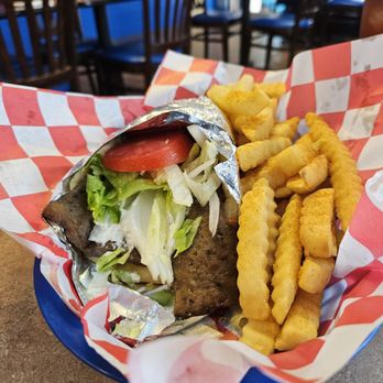 Eirinis Gyros and More - This masterpiece of a Gyro did not stand a chance! It was absolutely delicious! - Greek Near Me - Corpus Christi, Texas Eirinis Gyros and More - This masterpiece of a Gyro did not stand a chance! It was absolutely delicious! - Greek Near Me - Corpus Christi, Texas