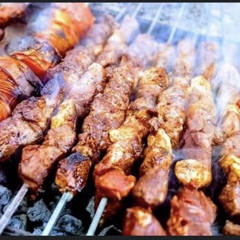 Al-Aqsa - a variety of skewers being cooked on a grill - Kebab Near Me - Boonton, New Jersey