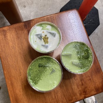 Offbeat Coffee - twice matcha latte with pistachio cream top (top) and twice matcha lattes - Coffee & Tea Near Me - Sacramento, California