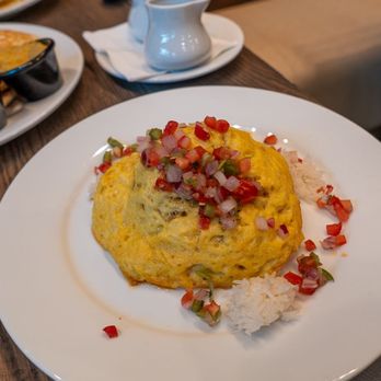 Kona Cafe - Plant-based Loco Moco (Vegan, Gluten Free) Plant-based JUST Eggs, Plant-based Impossible Sausage Gravy, Rice, and Pico de Gallo - Sushi Bars Near Me - Lake Buena Vista, Florida