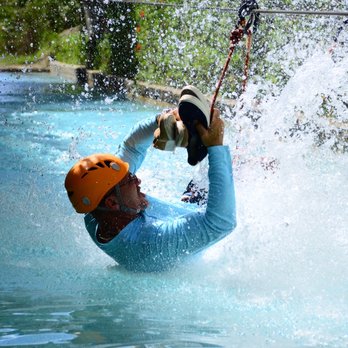 RISA Travel - End of zip line A lot of fun - Travel Services Near Me - Miami, Florida