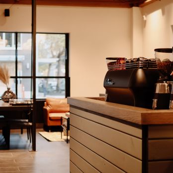 Black Arrows Coffee - a coffee machine on a counter - Coffee Roasteries Near Me - Seattle, Washington