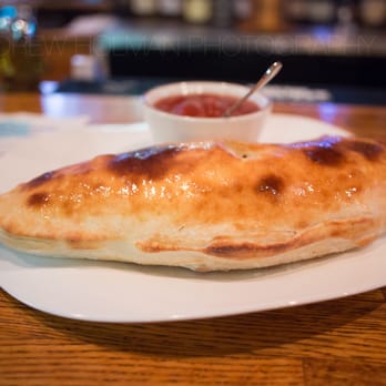 Fiori D'Italia - HUGE calzone! two meals for me, and I'm a pig - Italian Near Me - Anchorage, Alaska Fiori D'Italia - HUGE calzone! two meals for me, and I'm a pig - Italian Near Me - Anchorage, Alaska