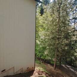3 stories high at rear of home due to steep slope.