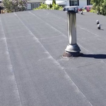 Royal Crown Roofing & Construction - This is the picture Royal Crown Roofing & Construction took of our new flat roof. - Roofing Near Me - Staten Island, New York Royal Crown Roofing & Construction - This is the picture Royal Crown Roofing & Construction took of our new flat roof. - Roofing Near Me - Staten Island, New York