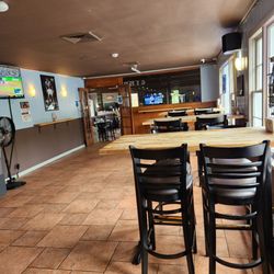 Ginny's Sports Bar & Grill - Inside seating