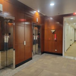 Leahi Business Services - Elevator bank on my floor and hallway to my office.