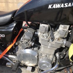 Craig's Cycles - Carburetors dangling.