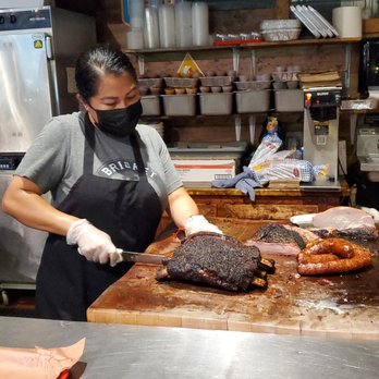 Terry Black's Barbecue - Cutting the Beef Rib - Barbeque Near Me - Austin, Texas Terry Black's Barbecue - Cutting the Beef Rib - Barbeque Near Me - Austin, Texas