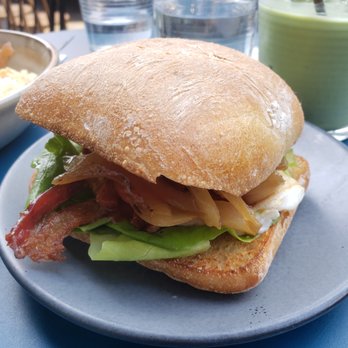 Banter - Bacon and egg roll (with a hint of a matcha latte in the back) - Breakfast & Brunch Near Me - New York, New York Banter - Bacon and egg roll (with a hint of a matcha latte in the back) - Breakfast & Brunch Near Me - New York, New York