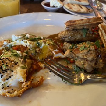 Nue - Shakshuka (left), chicken and waffles (right) - Tapas/Small Plates Near Me - Seattle, Washington Nue - Shakshuka (left), chicken and waffles (right) - Tapas/Small Plates Near Me - Seattle, Washington