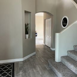 a staircase leading to a living room