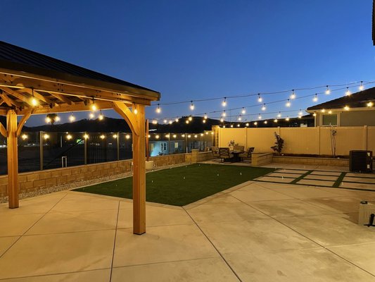 Professional string light installation - After building a pergola for our client, he was looking to have professional grade string lights installed, we tackled this job with ease securing strong guidewires to several points in the yard and finishing the installation with an added outlet to power them. The space is now inviting and ready for nighttime entertaining. Professional string light installation - After building a pergola for our client, he was looking to have professional grade string lights installed, we tackled this job with ease securing strong guidewires to several points in the yard and finishing the installation with an added outlet to power them. The space is now inviting and ready for nighttime entertaining.