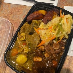 Curry goat and oxtails Curry goat and oxtails