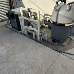New pool filter, chlorinator, and heater system.