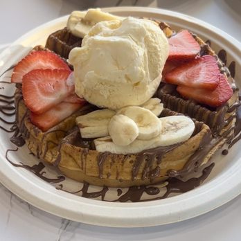 Nour's Cafe - Ice cream loaded waffle with strawberries, bananas and Nutella - Cafes Near Me - Sacramento, California Nour's Cafe - Ice cream loaded waffle with strawberries, bananas and Nutella - Cafes Near Me - Sacramento, California