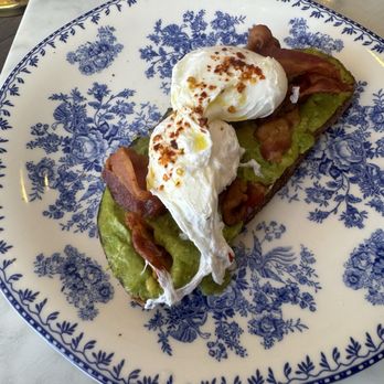 Orange Blossom - Bacon Avocado Toast with perfect poached eggs - Breakfast & Brunch Near Me - Miami Beach, Florida Orange Blossom - Bacon Avocado Toast with perfect poached eggs - Breakfast & Brunch Near Me - Miami Beach, Florida