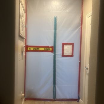 WFM Restoration - Garage entry way, downstairs bathroom and guest bedroom sealed off. - Damage Restoration Near Me