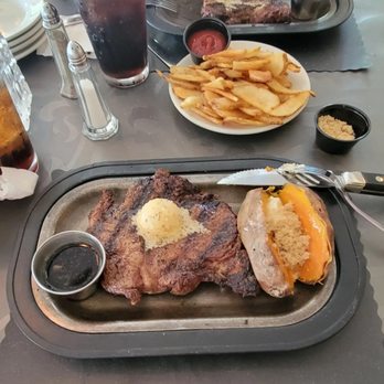 The Shores - a plate of steak and french fries - Steakhouses Near Me - Fox Lake, Wisconsin The Shores - a plate of steak and french fries - Steakhouses Near Me - Fox Lake, Wisconsin