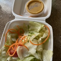 Salad and orange stuff...and entree I did not eat Salad and orange stuff...and entree I did not eat
