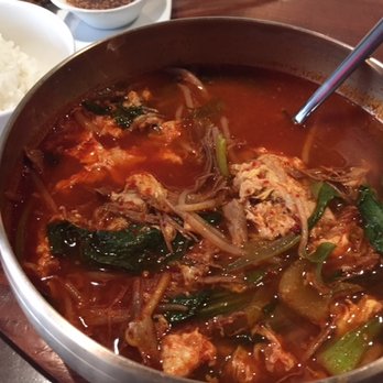 Mandu - Yookgejang: spicy beef broth with shredded beef, bean sprouts, eggs, and leaks (I think....) So good! - Korean Near Me - Washington, DC, District of Columbia