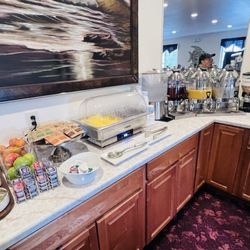 Ocean View Inn - Breakfast buffet featuring eggs and juice
