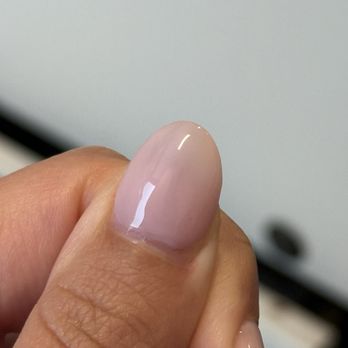 Gloss Nail Spa - On the bottom right of my thumbnail there is a visible difference between the second coat and the first coat of polish. Sloppy work :( - Nail Salons Near Me - Pasadena, California