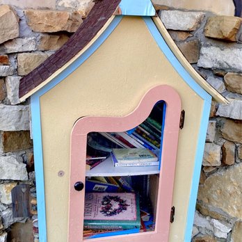 Kimzey's Coffee - Small library box in the front courtyard. - Coffee & Tea Near Me - Argyle, Texas