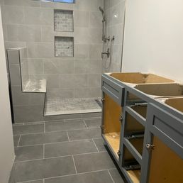 Tile work mostly complete and vanity rough installation