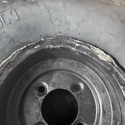 Rim damaged with pieces missing, unable to hold a seal.  New tire damaged and is unusable, bubble in sidewall.