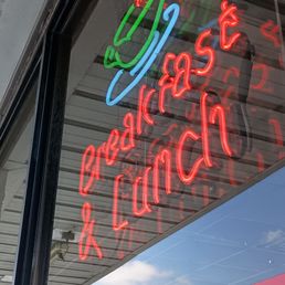 Exterior outside entrance of Gaylyn's Diner - Breakfast and Lunch Neon Sign In Front Window. - Leland, North Carolina Exterior outside entrance of Gaylyn's Diner - Breakfast and Lunch Neon Sign In Front Window. - Leland, North Carolina