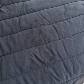 Neri's Cleaning Solutions - Stain left behind on comforter - Office Cleaning Near Me
